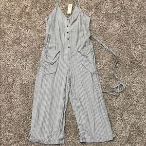 Black and White Striped Jumpsuit with Wide Leg and Tie Waist